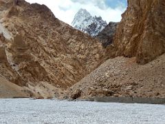 03 Mountain Poking Out Above The Limestone Cliffs In The Shaksgam Valley After Leaving Kerqin Camp On Trek To K2 North Face In China